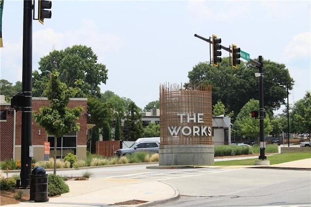 728 Antone St NW, Atlanta, GA 30318 - view of asphalt street with traffic lights, curbs, sidewalks, and street lights