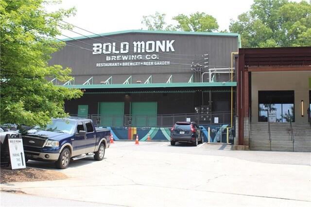728 Antone St NW, Atlanta, GA 30318 - view of building exterior with uncovered parking