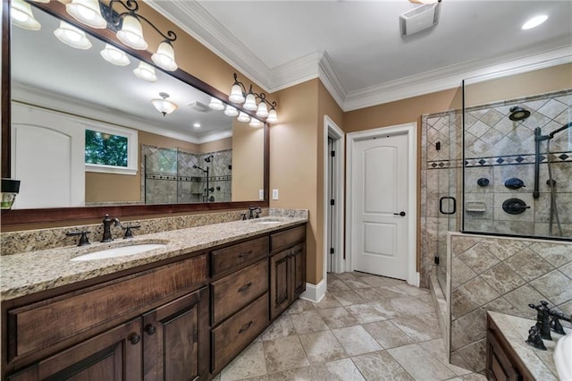 bathroom with vanity, crown molding, and independent shower and bath