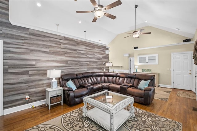 living area featuring wood finished floors, recessed lighting, ceiling fan, and an accent wall