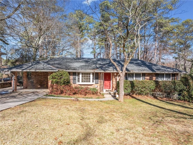 ranch-style house with a front yard and a carport