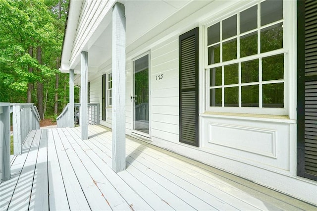 wooden deck featuring a porch