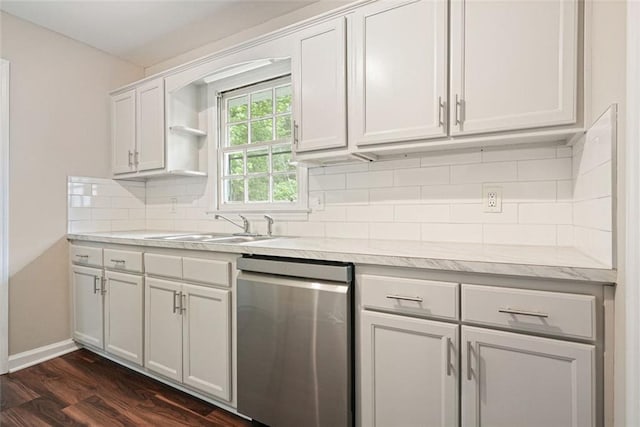 kitchen featuring stainless steel dishwasher, a sink, open shelves, dark wood finished floors, and light countertops