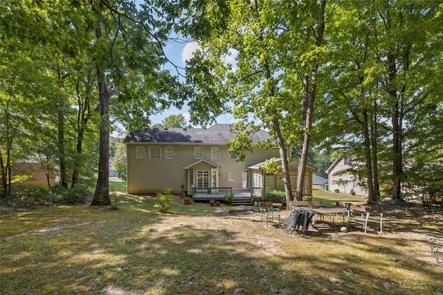 exterior space featuring a yard and a deck