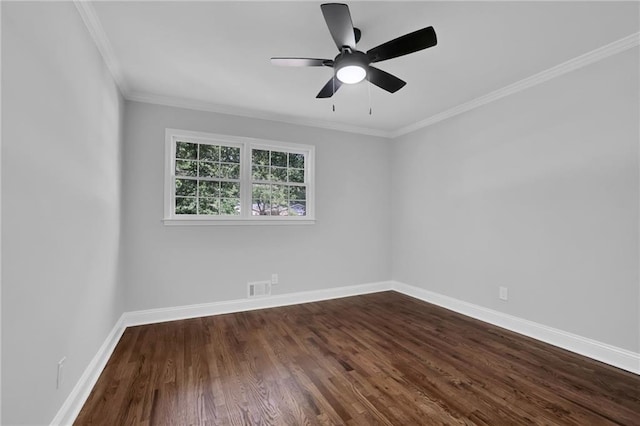 4669 Dunover Cir, Atlanta, GA 30360 - spare room featuring dark wood finished floors, ornamental molding, and a ceiling fan