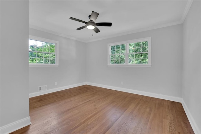 4669 Dunover Cir, Atlanta, GA 30360 - empty room featuring wood finished floors, crown molding, and a ceiling fan