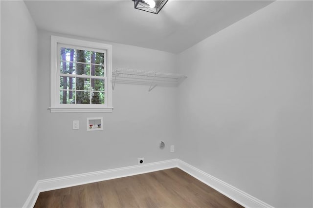 4669 Dunover Cir, Atlanta, GA 30360 - laundry room featuring electric dryer hookup, dark wood-style floors, and hookup for a washing machine