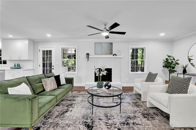 4669 Dunover Cir, Atlanta, GA 30360 - living room with crown molding, healthy amount of natural light, a ceiling fan, recessed lighting, and wood finished floors