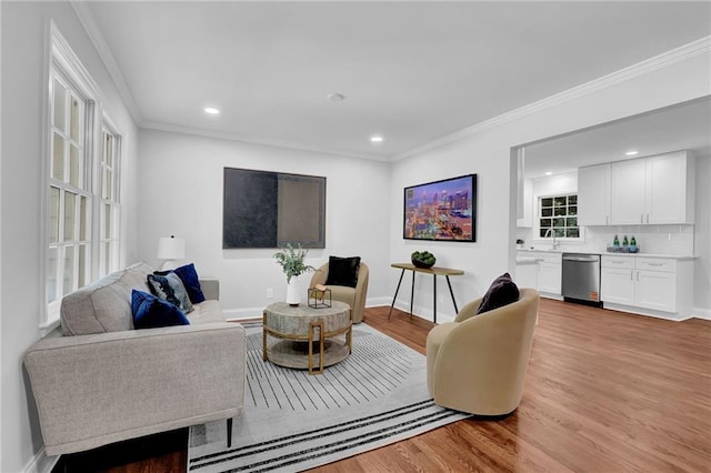 4669 Dunover Cir, Atlanta, GA 30360 - living room with light wood-style floors, crown molding, and recessed lighting
