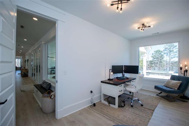 office space with recessed lighting, baseboards, and wood finished floors