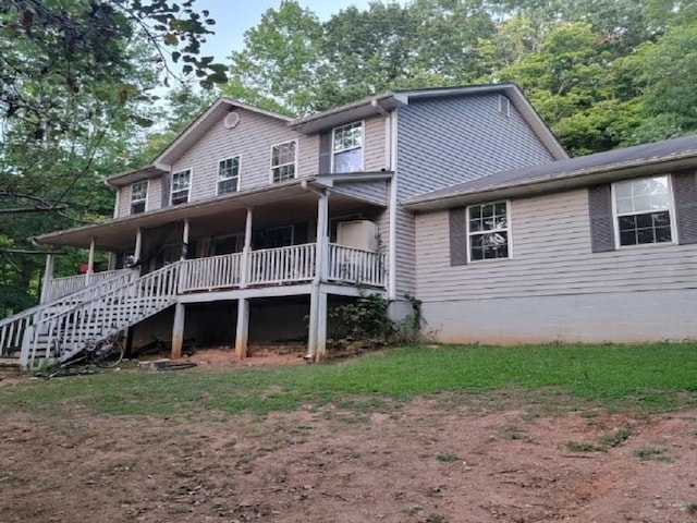 view of front of property with stairs