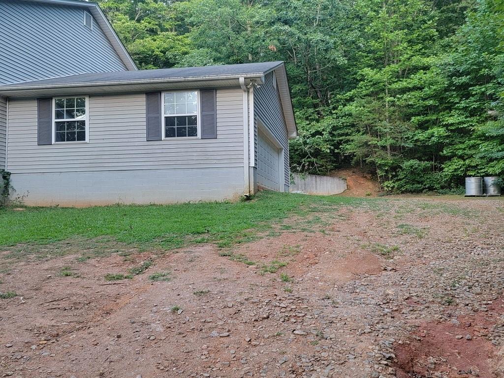 view of property exterior featuring a garage