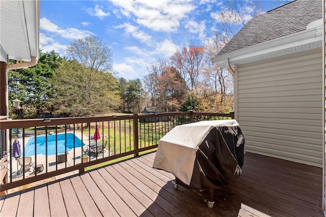 wooden terrace featuring grilling area