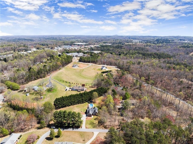 aerial view featuring a forest view
