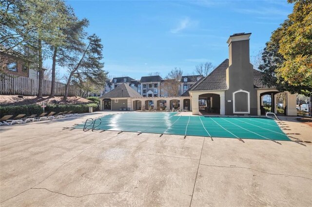 2657 Lenox Rd Unit C30, Atlanta, GA 30324 - community pool with a patio and fence