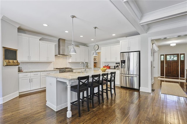 1297 Conway Rd, Decatur, GA 30030 - kitchen with stainless steel appliances, wall chimney range hood, a sink, crown molding, and white cabinetry