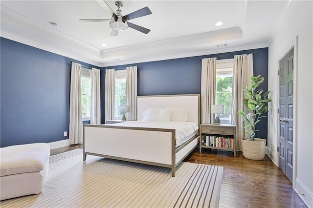 1297 Conway Rd, Decatur, GA 30030 - bedroom featuring a tray ceiling, ornamental molding, wood finished floors, baseboards, and recessed lighting