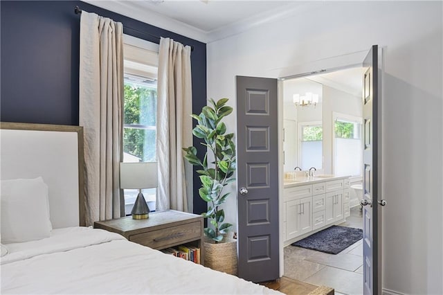 1297 Conway Rd, Decatur, GA 30030 - bedroom featuring ornamental molding, multiple windows, a chandelier, ensuite bath, and a sink