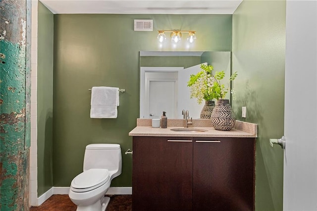 170 Boulevard Se 115E, Atlanta, GA 30312 - full bath featuring toilet, baseboards, vanity, and a shower with curtain