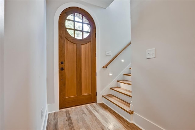 foyer entrance with light hardwood / wood-style floors