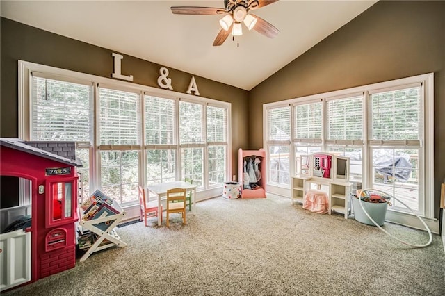 rec room with plenty of natural light, ceiling fan, and carpet floors