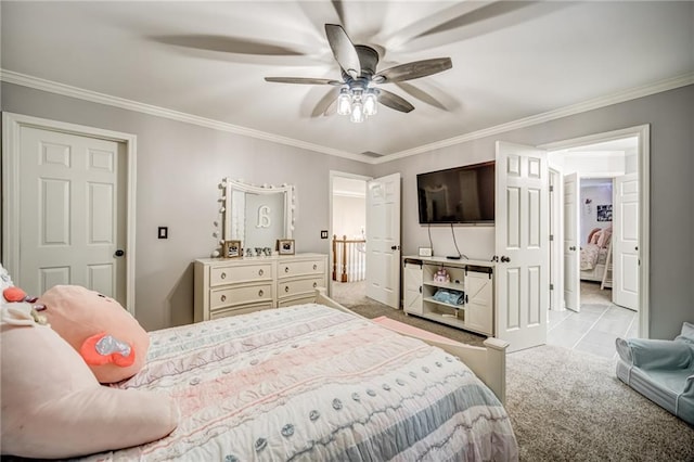 bedroom featuring crown molding, ceiling fan, and light colored carpet