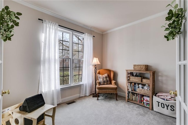 living area featuring crown molding, carpet flooring, baseboards, and visible vents