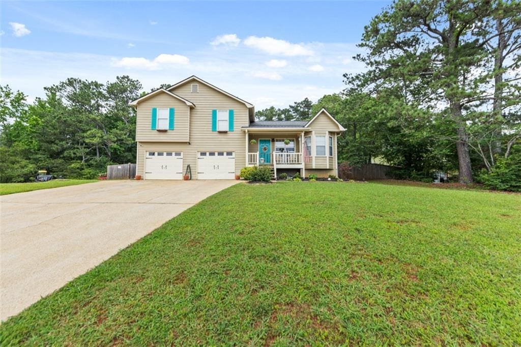 5 White Pines Dr, Dallas, GA 30157 - split level home featuring a garage, driveway, and a front yard