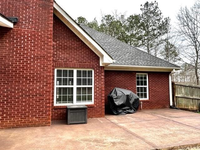 view of patio / terrace with fence and grilling area