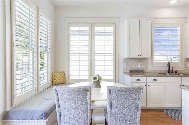 dining room with light wood finished floors