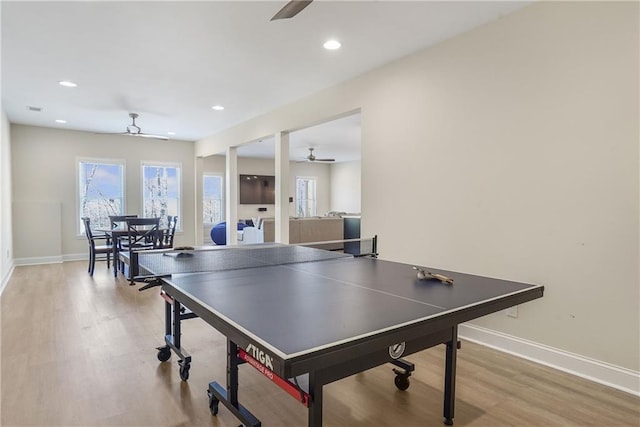 game room featuring light wood finished floors, recessed lighting, a ceiling fan, and baseboards