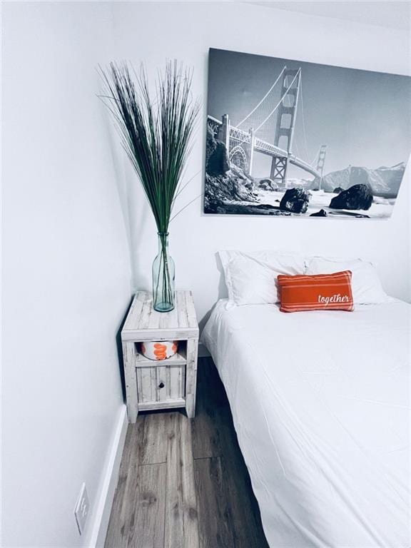 bedroom featuring hardwood / wood-style floors