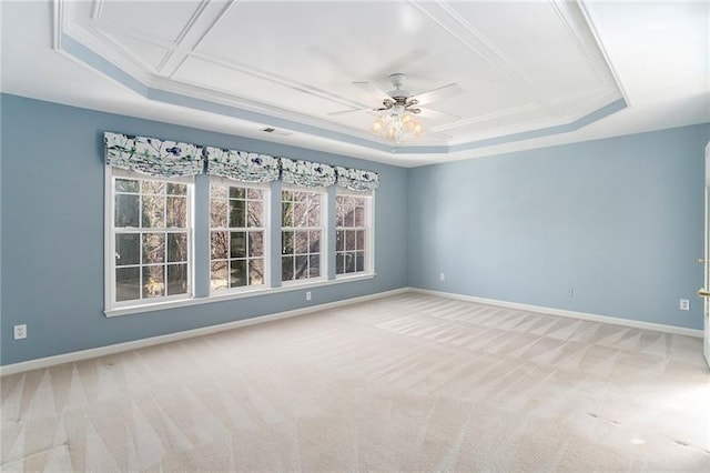 3505 Belridge Ln, Smyrna, GA 30080 - empty room with light colored carpet, ceiling fan, baseboards, a tray ceiling, and crown molding