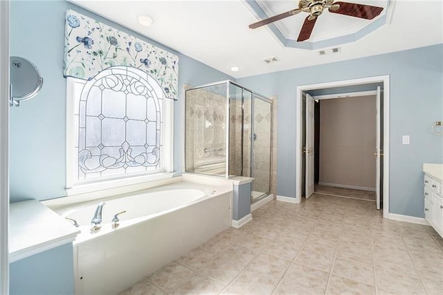 3505 Belridge Ln, Smyrna, GA 30080 - bathroom with ceiling fan, a shower stall, a garden tub, vanity, and baseboards