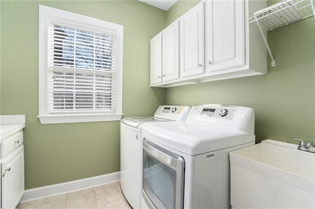 3505 Belridge Ln, Smyrna, GA 30080 - washroom with independent washer and dryer, cabinet space, baseboards, and plenty of natural light