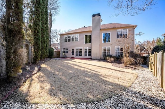 3505 Belridge Ln, Smyrna, GA 30080 - rear view of property with a chimney and a fenced backyard