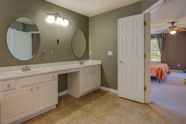 bathroom featuring vanity and ceiling fan