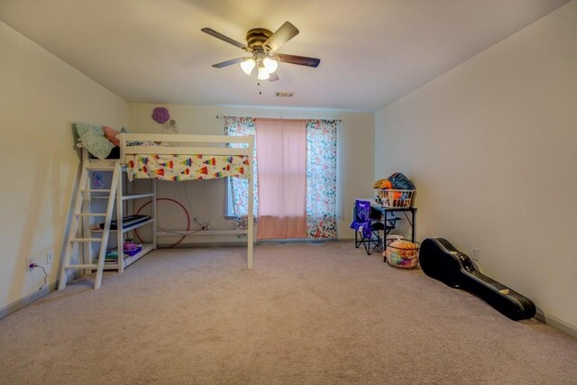 bedroom featuring carpet floors and ceiling fan