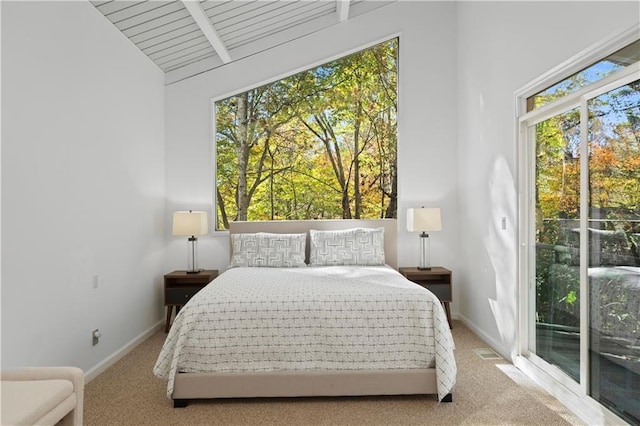 carpeted bedroom with high vaulted ceiling, access to outside, wood ceiling, and beam ceiling