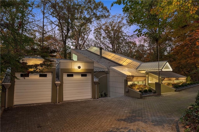 modern home featuring a garage