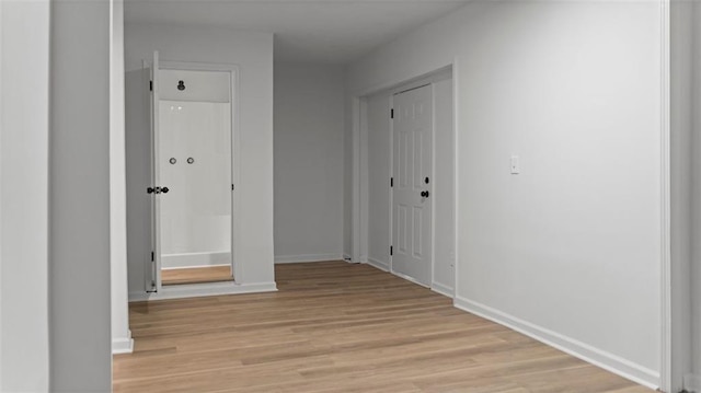 3735 Benchmark Dr, Atlanta, GA 30349 - hall featuring light wood-style flooring and baseboards