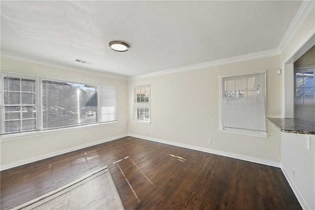 unfurnished room featuring ornamental molding and hardwood / wood-style floors