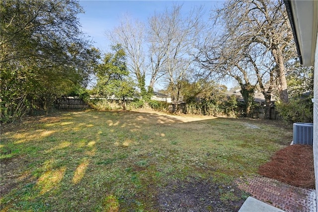 view of yard featuring central air condition unit