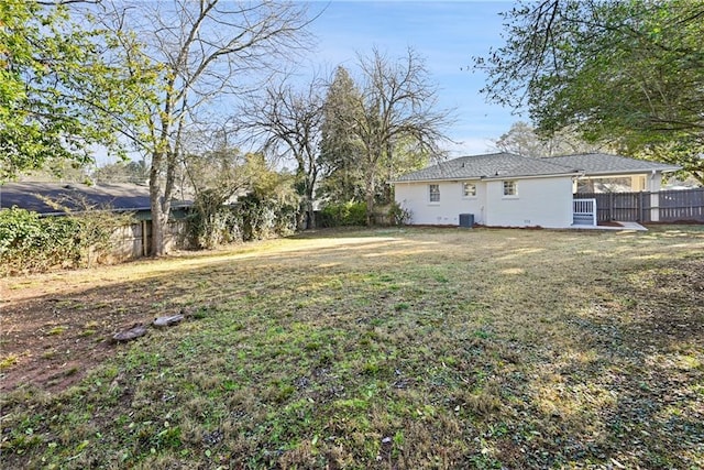 view of yard with central AC