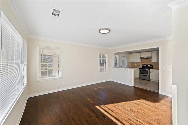 unfurnished living room featuring crown molding and dark wood-type flooring