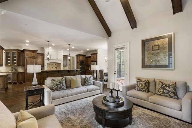 living room featuring lofted ceiling with beams, dark wood-type flooring, and recessed lighting