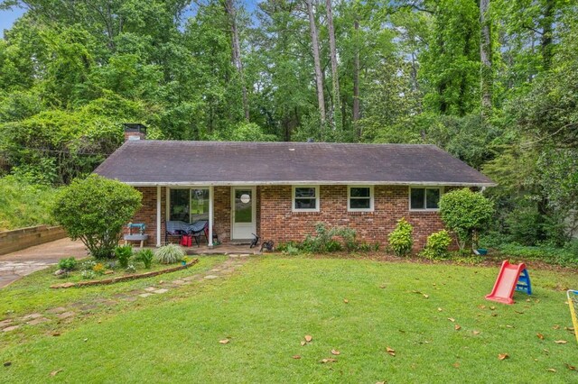 view of front of home with a front yard