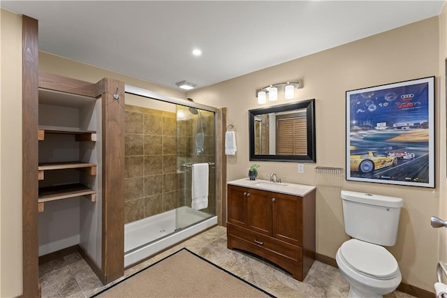 2109 Pine Tree Cir, Gainesville, GA 30501 - bathroom featuring vanity, a stall shower, toilet, baseboards, and recessed lighting
