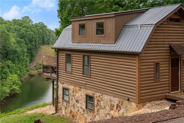 2109 Pine Tree Cir, Gainesville, GA 30501 - view of side of property with a water view, metal roof, stone siding, and faux log siding