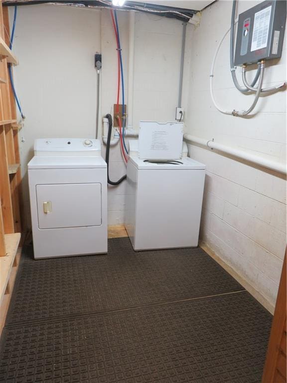 laundry room featuring laundry area, independent washer and dryer, and electric panel